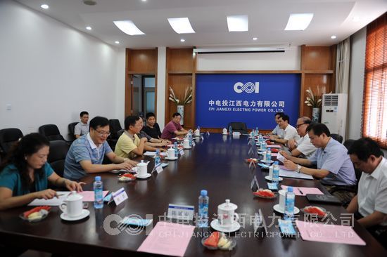 郑武生会见淮南矿业集团董事长王源一行